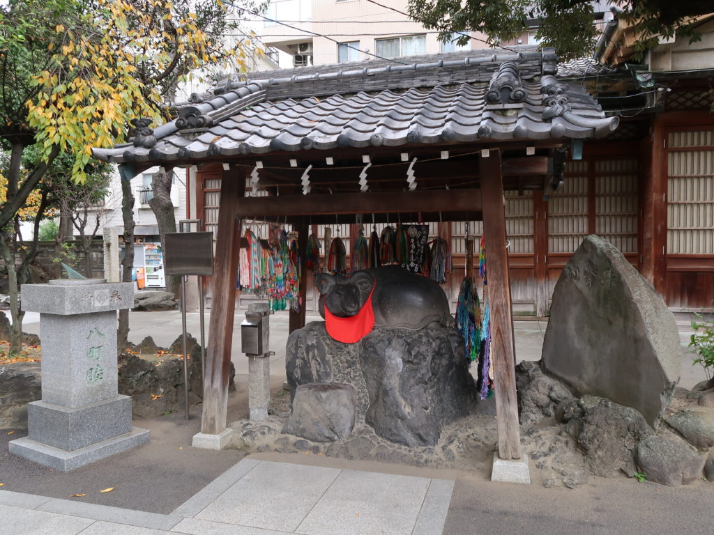 Sacred cow statue at Ushijima Shrine in Tokyo known as Nade Ushi for good health and healing