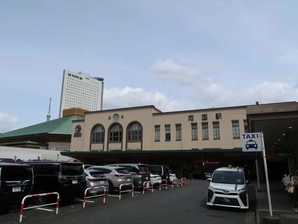 Ryogoku Station exterior in Tokyo with Tokyo Skytree visible in the background