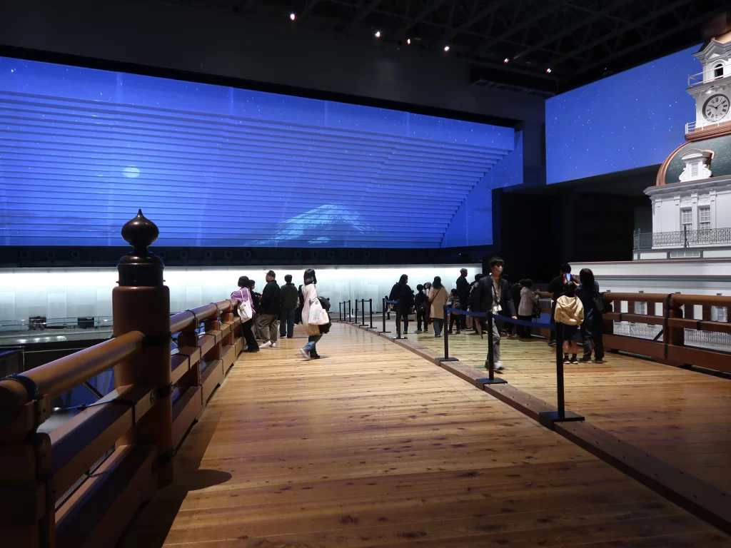 visitors walking on Nihonbashi model Edo Tokyo Museum